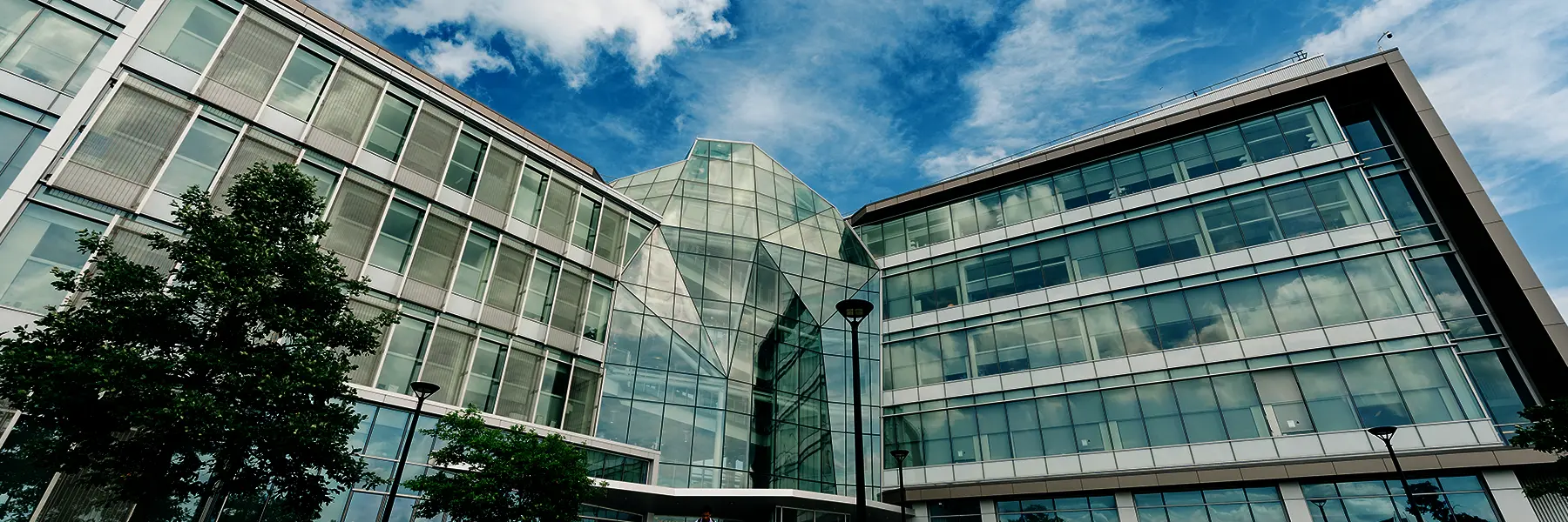 Integrated Sciences Complex outdoors blue skies.